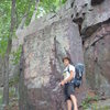 Nice boulder with a good landing. Behind it is an inside corner "The Revolt of the Nerds" 5.6