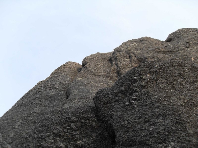 Looking up the "Standard Routes" on Moby Dick.  The short easy face climb is in the foreground, then the step across, then at the top you can see the left and right cracks.  I went up the right crack, but you could also make a delicate step left after the step across and then go up the right crack.