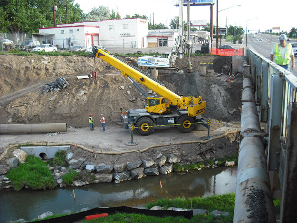 Rollin (for now) with the energy program. Installing one of many bridges for Dvr's light rail system. This one is a little bridge, but a difficult one with a bunch of crap in the way.<br>
<br>
Not climbing, but it's a cool shot for the tough jobs crowd.