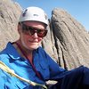 Dave Meyer on/in the big window on top of Rhinoceros Rock. That's Inner Course in the background on the right.<br>
(Photo by Lenore Sobota) 