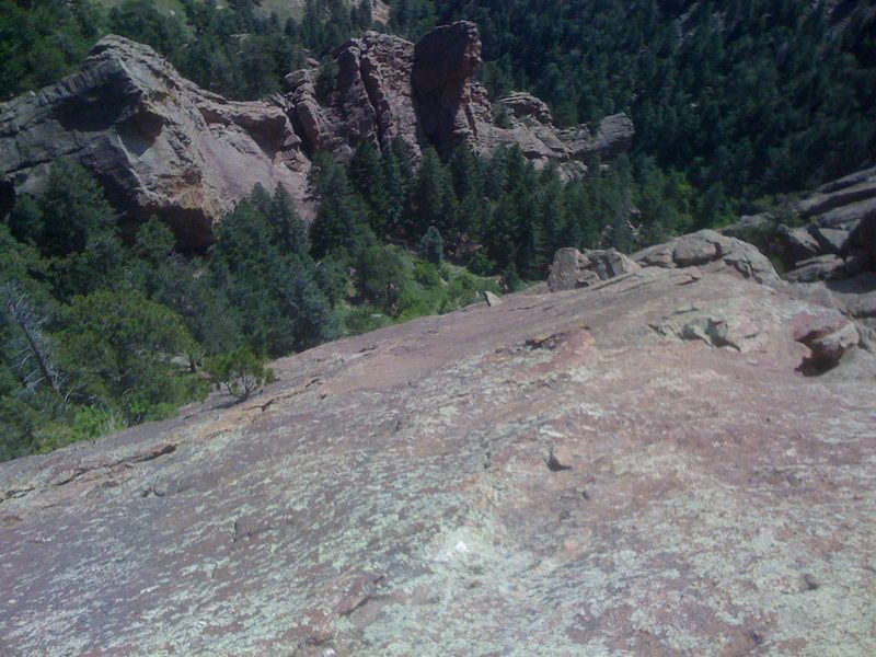 Looking down the upper pitches of 666 - the broken area to the right is the large chimney/gully separating the 3rd and 4th sections of Ridge Two.  The back of Ridge One is visible in the top of the frame.