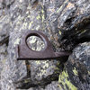 This is an old iron piton set in a crack at the top of the cliff formed by the south ridge of The Dark Tower.