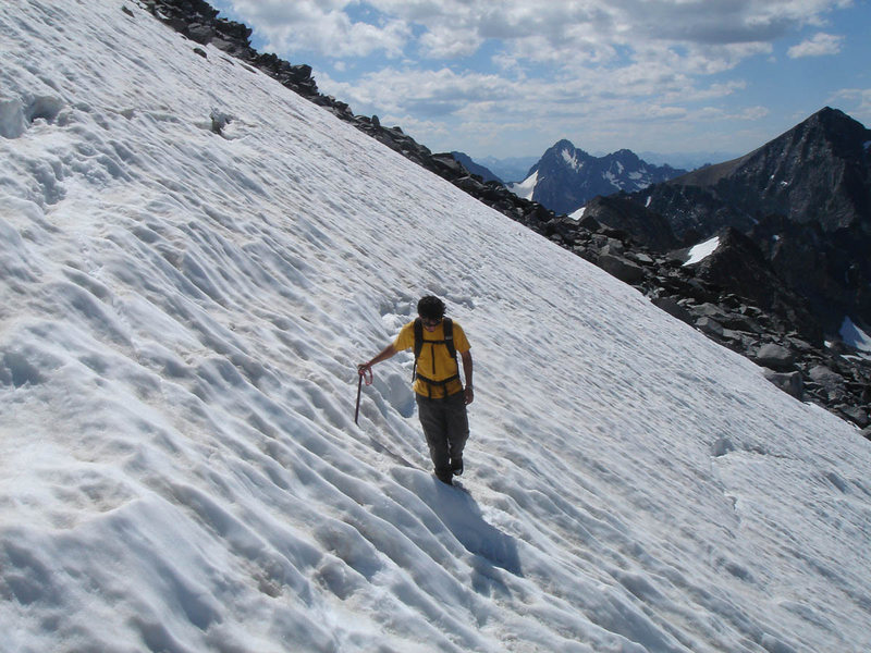 Lluis crossing the snowfield to the East Col notch.