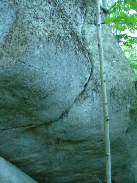 Another crack to the right of the previous prominent crack. Starts with steep rock at your feet then pulls onto a slab