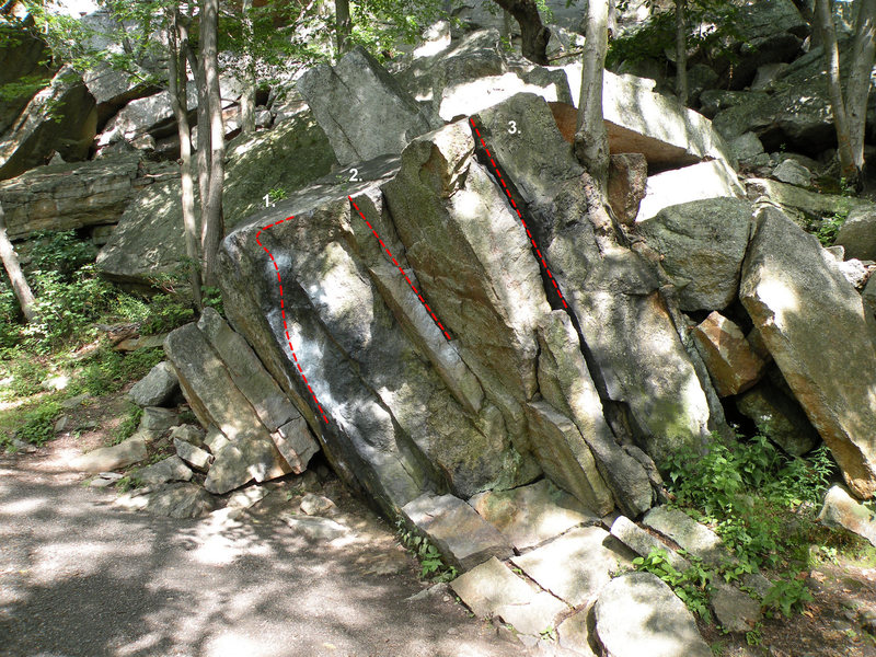 The Black boulder, in the Pebbles Area area:<br>
1. [[106518842]]<br>
2. [[Black Boulder Crack]]106515321 <br>
3. [[Black Boulder Lay-back (V0)]]106515326 