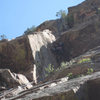 The crux roof on pitch 2 of Tagger.