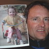 Craig with his daughter, Guilia's picture.  Craig always put up pictures of her all around his bed when he traveled.  He missed her so.