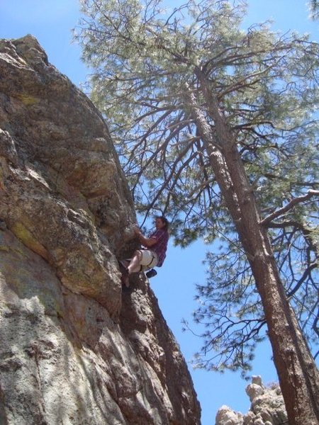 Muscling through the crux.