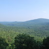 This is the view from Sundown's Alcohol Wall. The Kancamagus highway can barely be seen snaking through the White Mountain National Forest. 