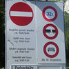 The stoplight for the road to Melchsee.  The toll for a car is 12 CHF (about 8 Eur or 12 USD). Pay inside the gondola building directly to the left.