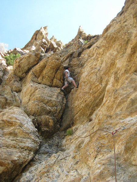 Tristan Higbee just past the crux on the second pitch of Send For The Man.