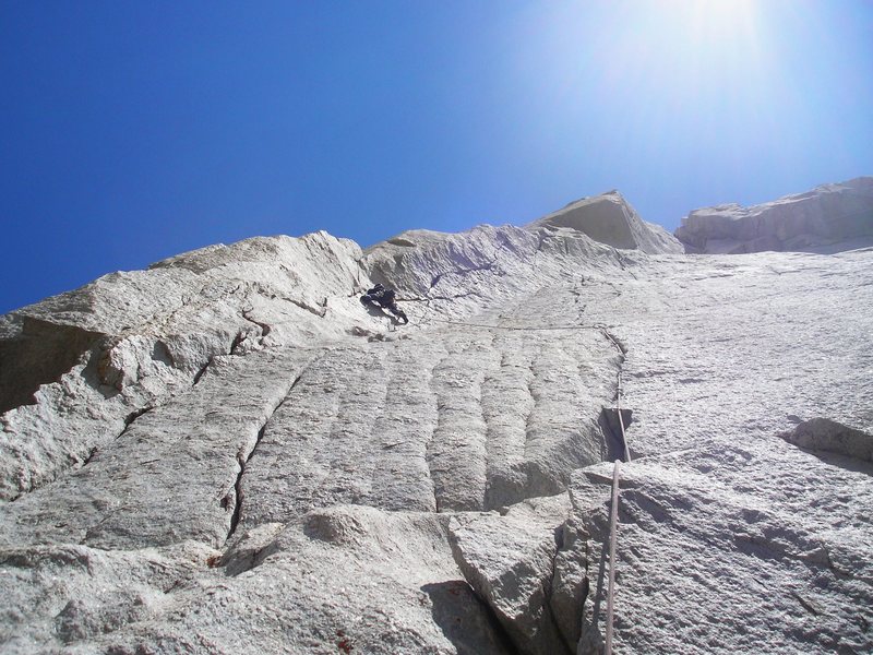 Monica leading the crux on pitch 6.