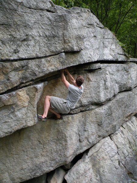 Micah begins the traverse over to the crack finish.