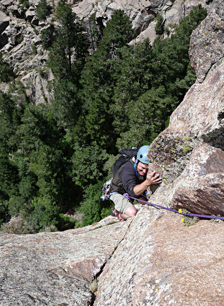 Matt cruising the final hand crack to the summit.