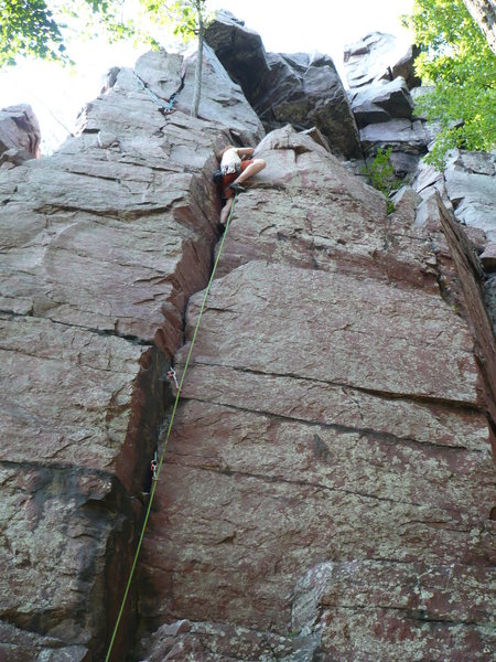 Chris Keller nearing the top of Hammer Crack<br>
<br>
Photo by John Knoernschild