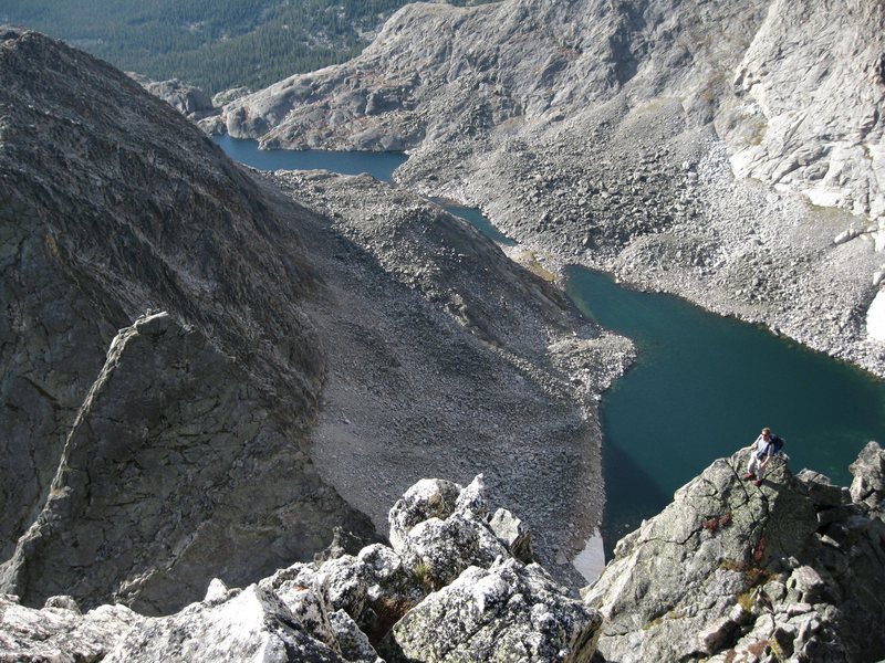 Keen Butterworth enjoying the smashing view of the lower Ypsilon cirque from atop the Blitzen Ridge headwall.