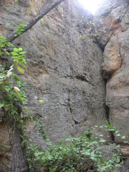 Practice wall in the middle (with rope), multiple variations exist. Offwidth is the crack on the right.