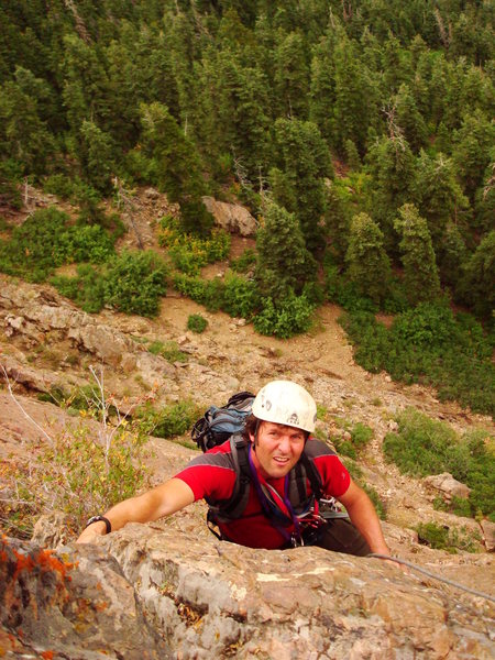 Adam Symonds nearing the top of the first pitch of the Left of Center route.