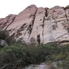 The route follows the crack in the center of the photo and ends on a sloping ledge just below the skyline and to the right of the crack.