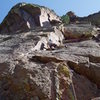 Starting the first crux--moving left around the arête.