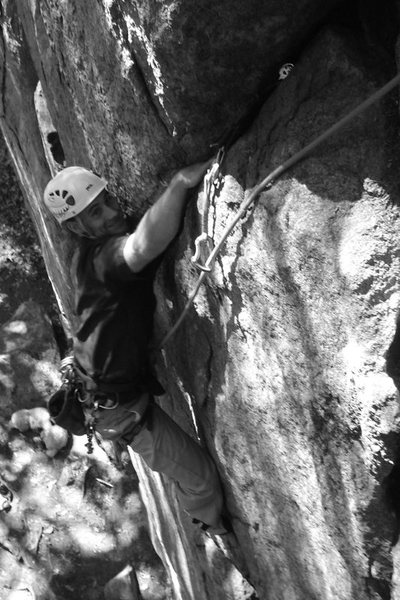 Adam Working hard at the crux and eyeing the jug...