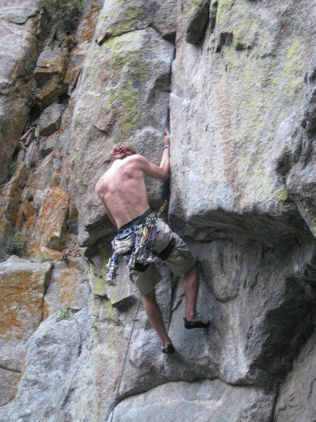 Jamming through the crux.