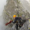 Preparing the 15m abseil to the path leading to the col behind the First Tower.