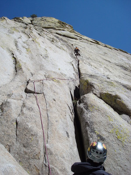 Joel K.  leading the first pitch of Innersanctum (5.9), Witch Needle. photo by Gomoll.