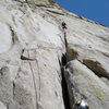 Joel K.  leading the first pitch of Innersanctum (5.9), Witch Needle. photo by Gomoll.