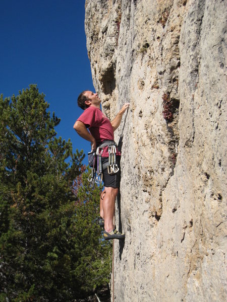 Climbing the attractive headwall of War Paint.