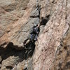 Danny on the overhanging 5.10 corner pitch on the Scenic Cruise.  This pitch immediately follows the peg traverse.