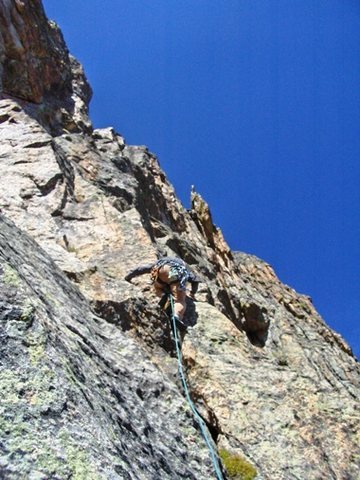 Roland starting up the "original finish" after traversing directly right from the belay notch at the top of P2.