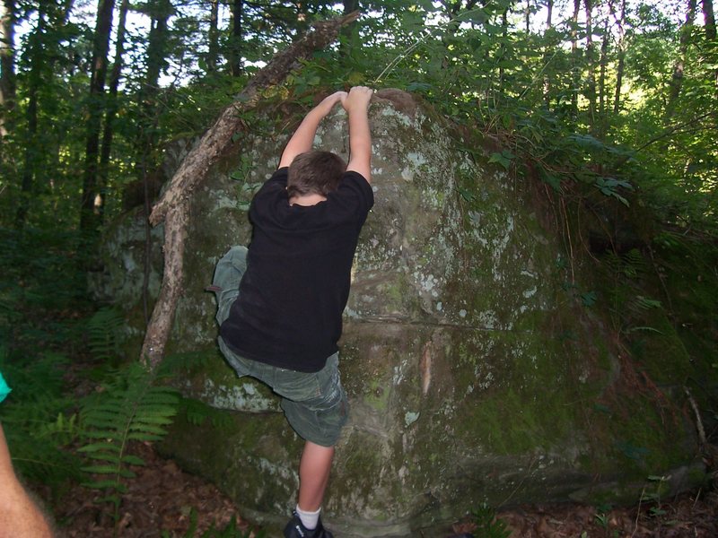 the boy on his 1st boulder problem - a possible FA ;)