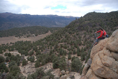 Setting up a rappel with a storm on the way.