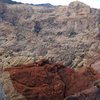 The views from Birdhunter Buttress/Rainbow Wall are incredible, and gives you a good sense of the vast, rugged terrian of Red Rock. <br>
<br>
Photo taken from midway up BB. A section of the colorful upper Brownstone Wall, and Bridge Mountain are visible.<br>
<br>
10/21/09