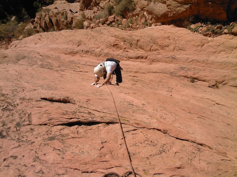 Bill Weiss above the third piton on P1.