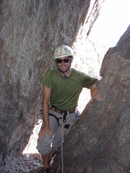 Tyler coming into the large chamber at the top of Pitch 1. 