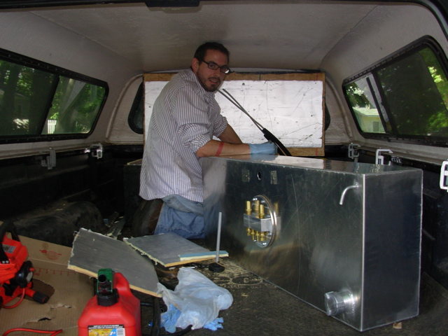 Finishing up the veggie oil conversion on my truck.