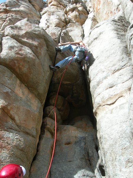 Jim leading the layback roof problem just above the start.  This is not the crux.  That's just before the end in the off-width.