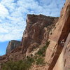 The vistas from this area are amazing.  Jim is cleaning the route on rappel.