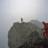 Climbing along the misty ridge.