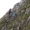 The trail markers: red dots, white circles.  This is shortly after the fourth to fifth begins looking left as you ascend the saddle.  Photo: Drew Benson