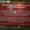 The signage located at the top of the Bruner Run take out road.  During rafting season, you'll need to buy a token, park here and take the shuttle bus down to the bottom, then its a short 5 min. walk to the crag.