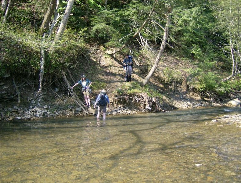 Cross the River to this side to pick up the trail