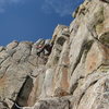 At the crux move looking down.<br>
<br>
Photo by Brad Cunningham.