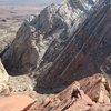 Paul following the final pitch ..way above the entrance of Three Fingers Canyon