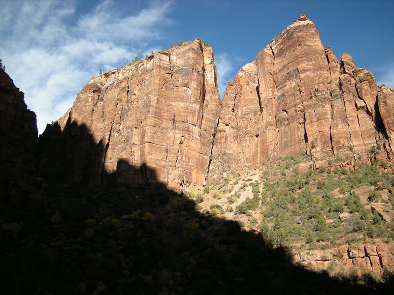 The route climbs the far left side of the wall. The formation on the left is Mt. Majestic and the formation on the right is The Spearhead