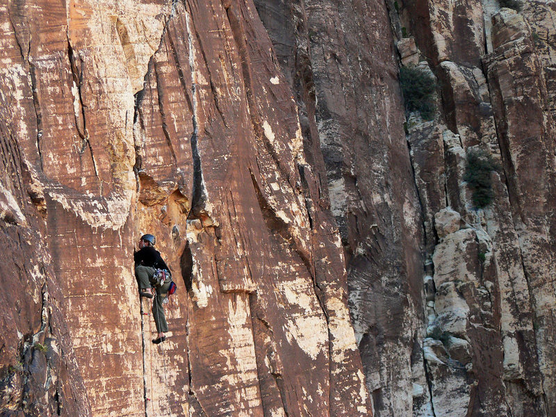 On the long first pitch of Wholesome Fullback. From here, the route heads right under the roof before pulling through the roof at the obvious dark crack (the route's crux). November 2008. 