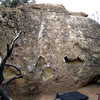 The Ant boulder, Piss Ant goes straight up from the right side of the large hueco.