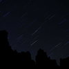 Stars over the Fisher Towers in Castle Valley, Utah.